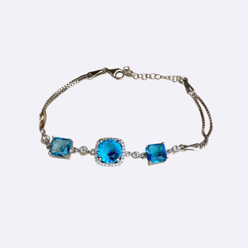 Silver Bracelet with Square Blue Topaz Stones