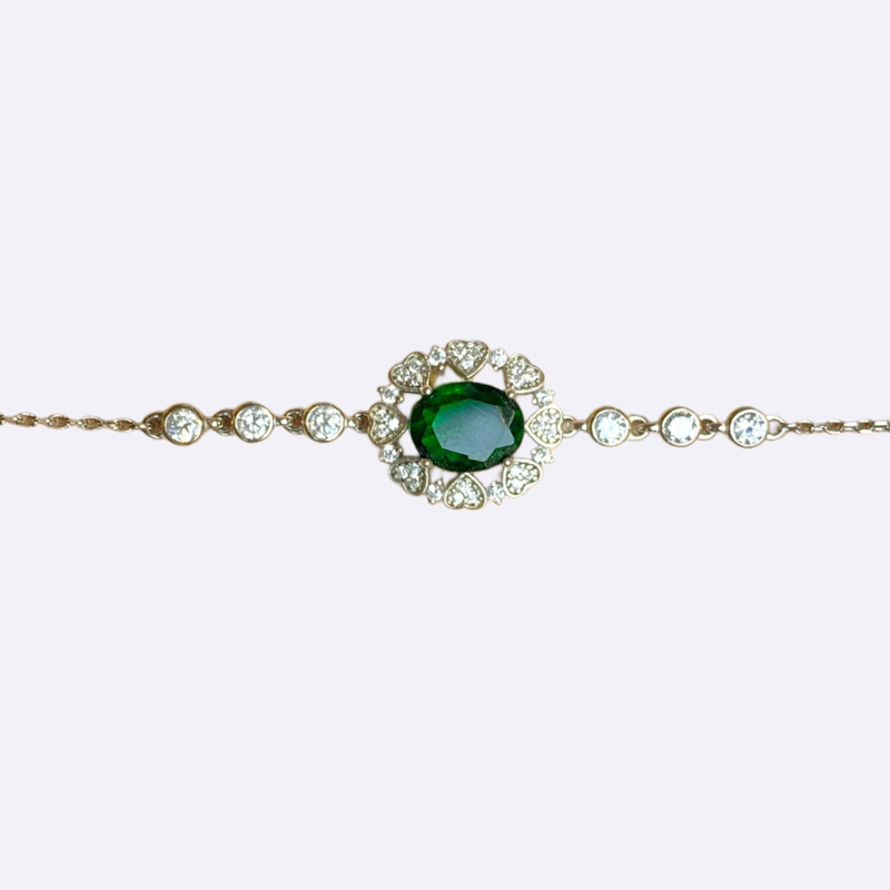 Silver Bracelet with Oval Green Stone and Heart Halo