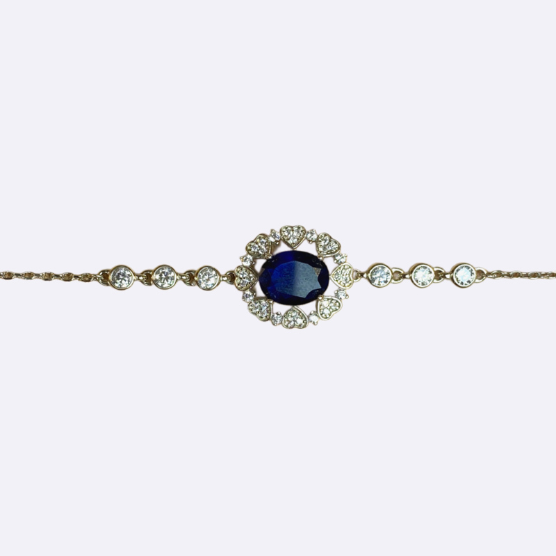 Silver Bracelet with Oval Blue Stone and Heart Halo